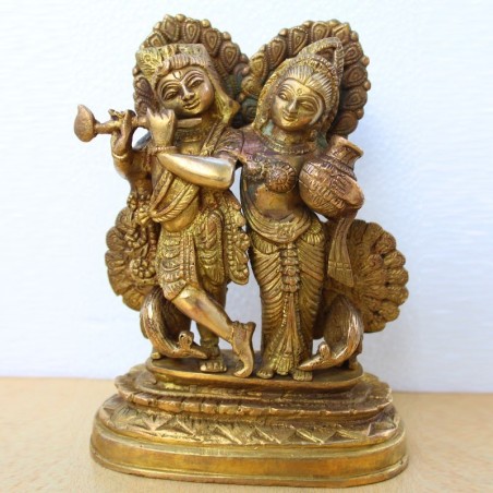 Fanciable Radha Krishna with cute peackock design