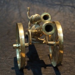 Beautiful Brass Cannon with a man 